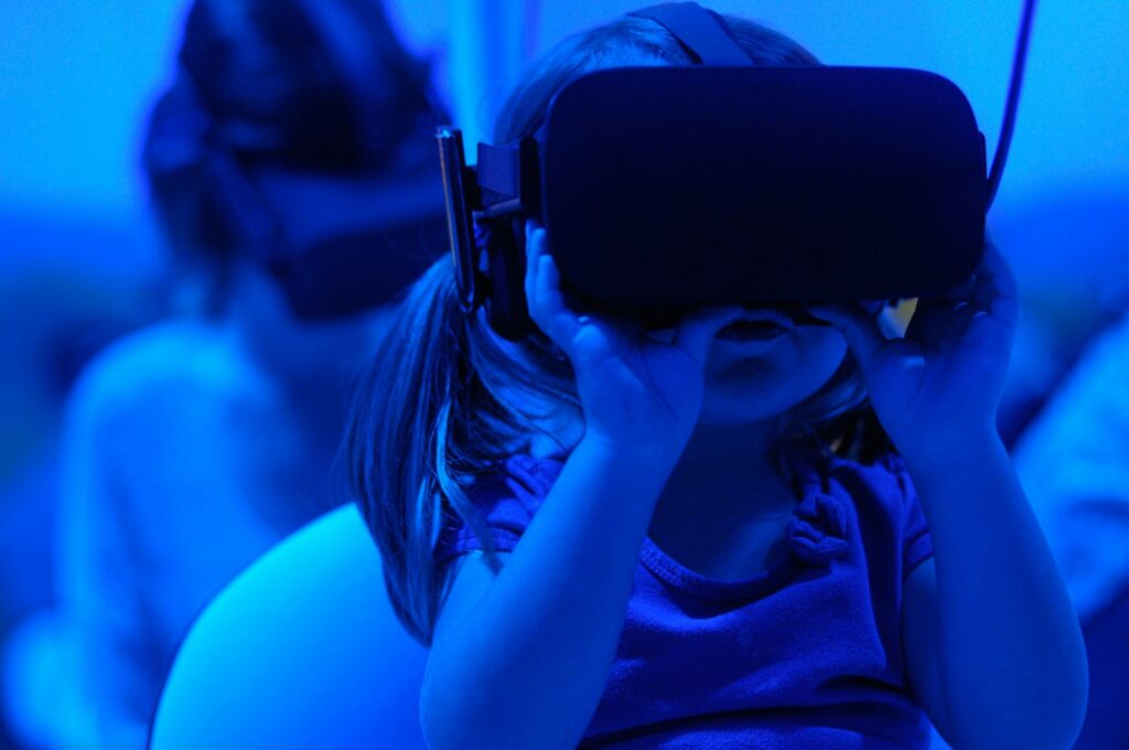 girl using VR goggles